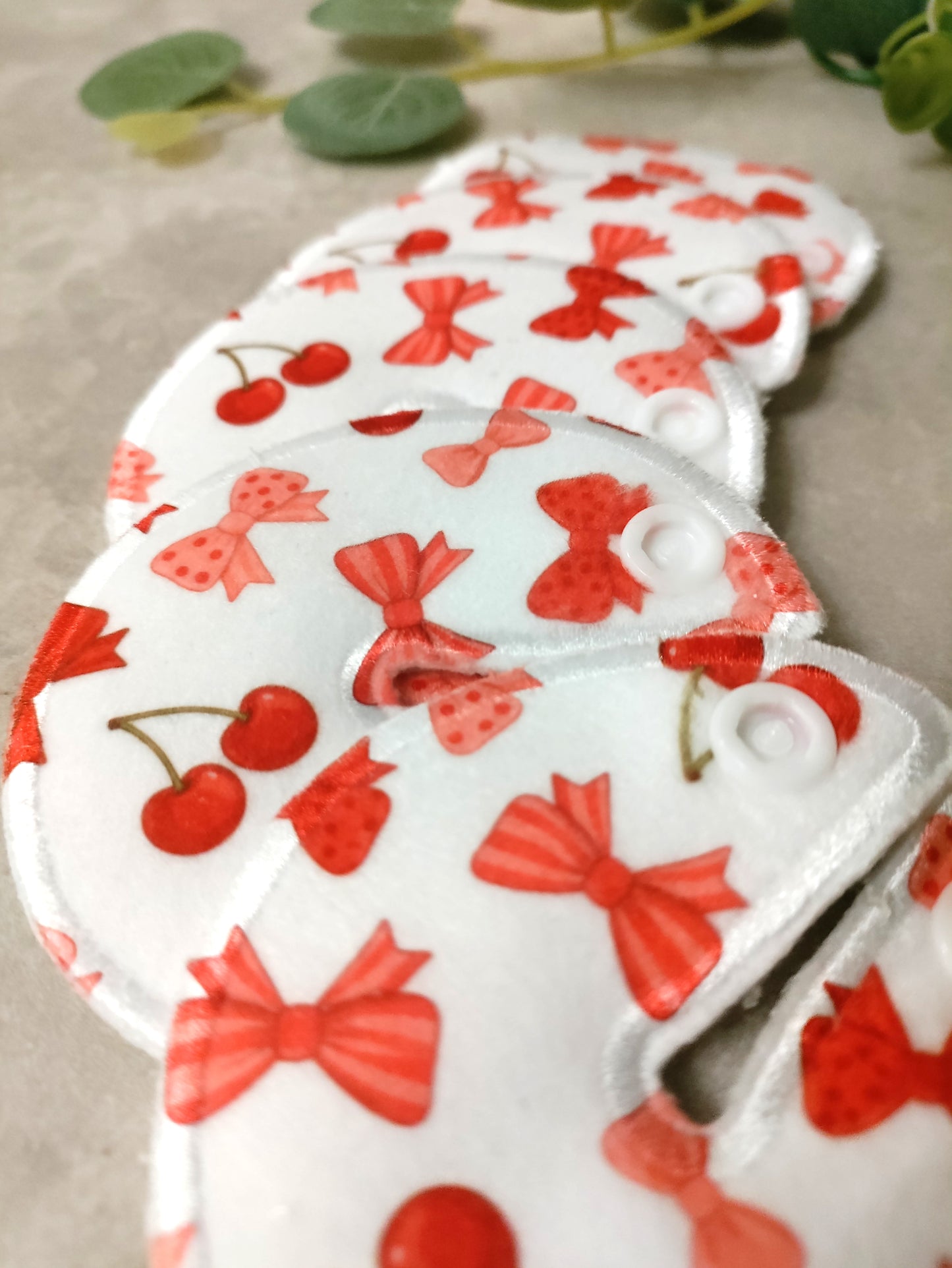 Cherries and bows star Tubie Pads