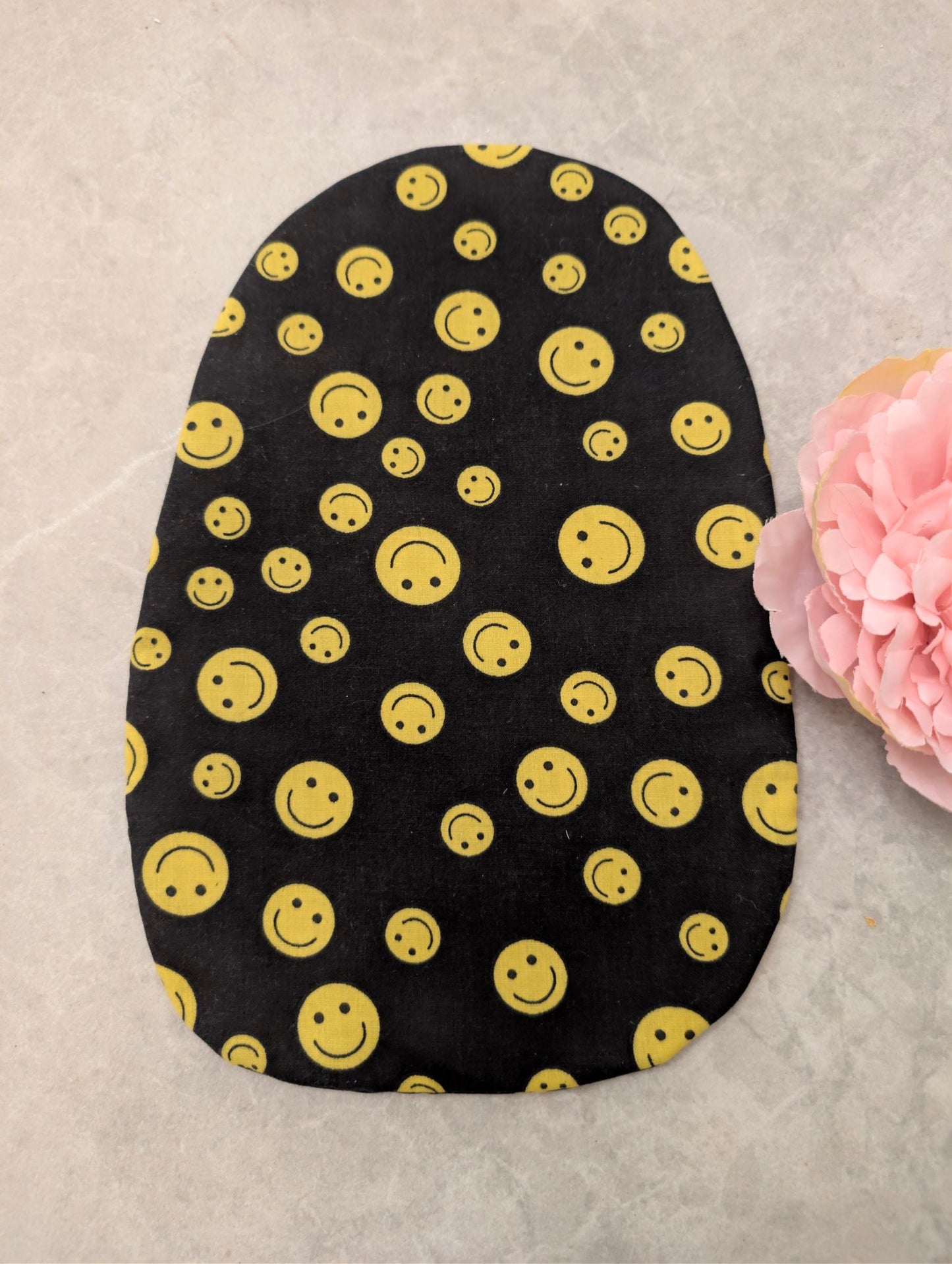 Black smiley face stoma bag cover