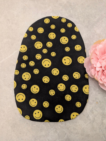 Black smiley face stoma bag cover